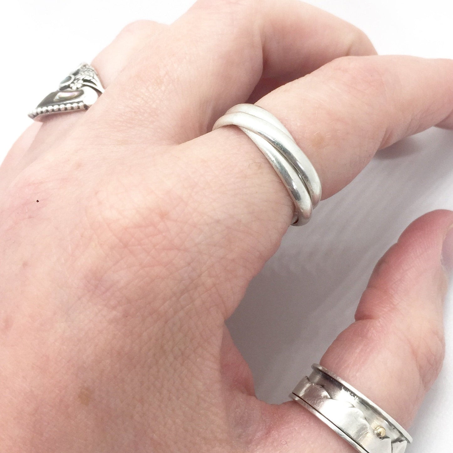 Kinetic Trinity Band Ring in Sterling Silver