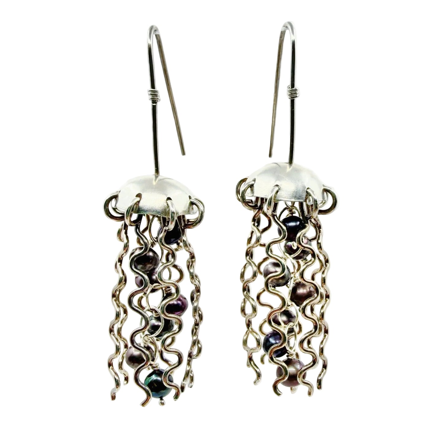 silver jellyfish earrings with dark pearl centers on a white background